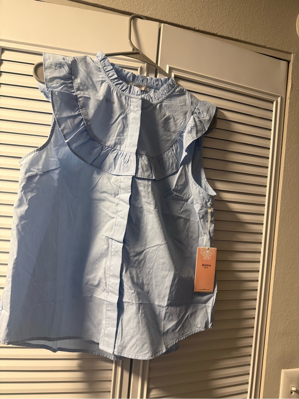 Sleeveless Light Blue Ruffle Yoke Top